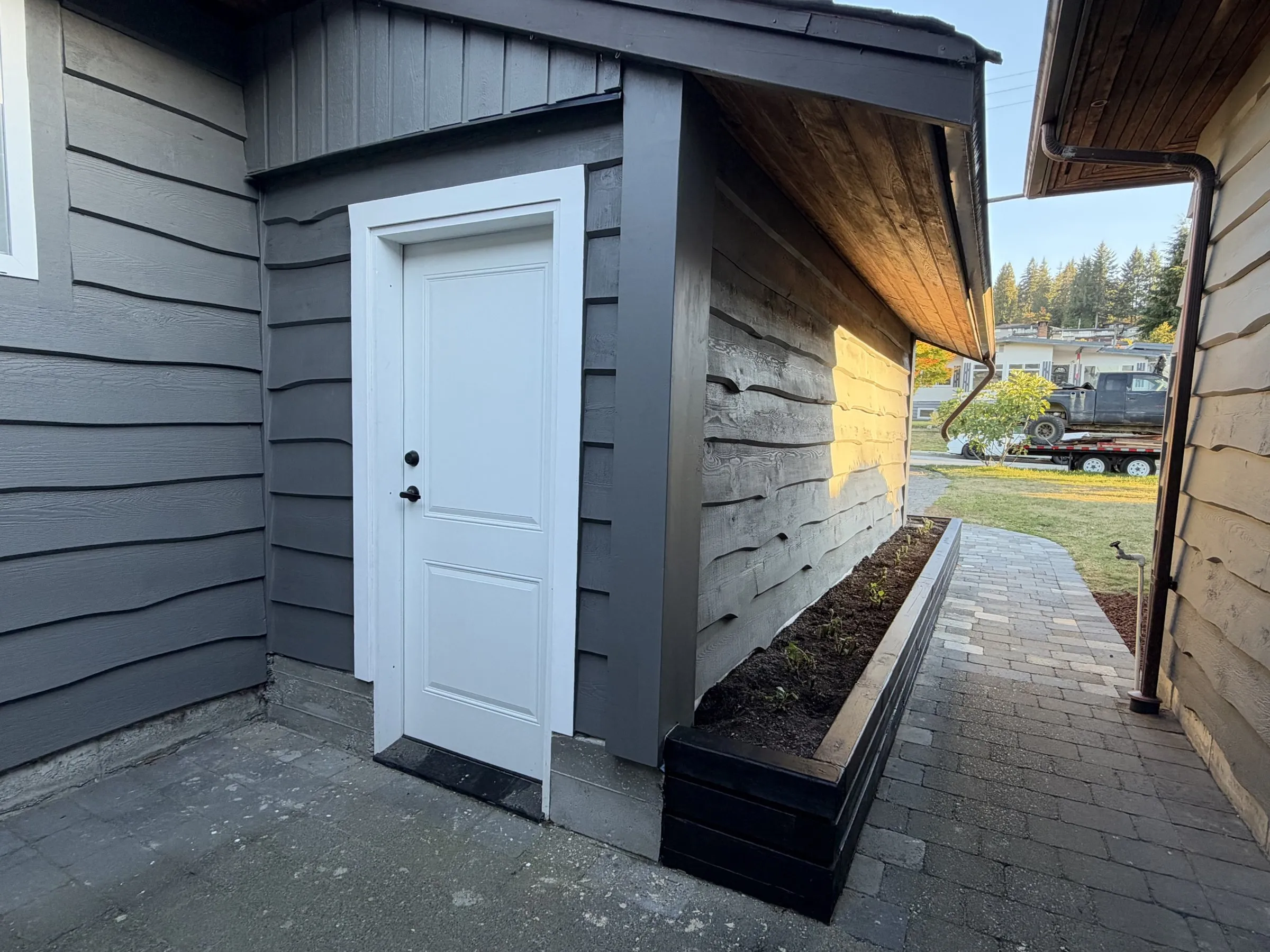 Side walkway and planter