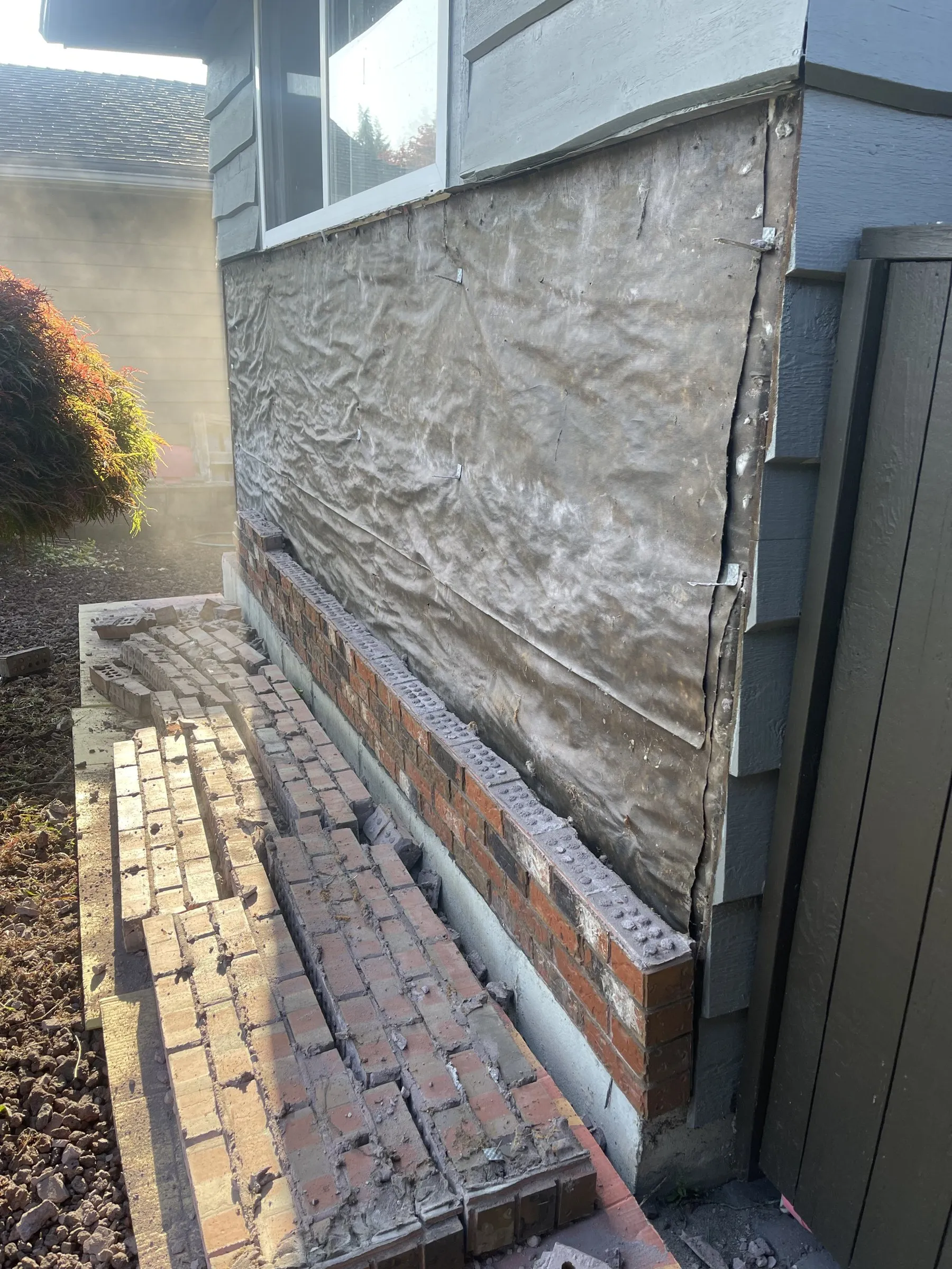 Brick removed, wall exposed