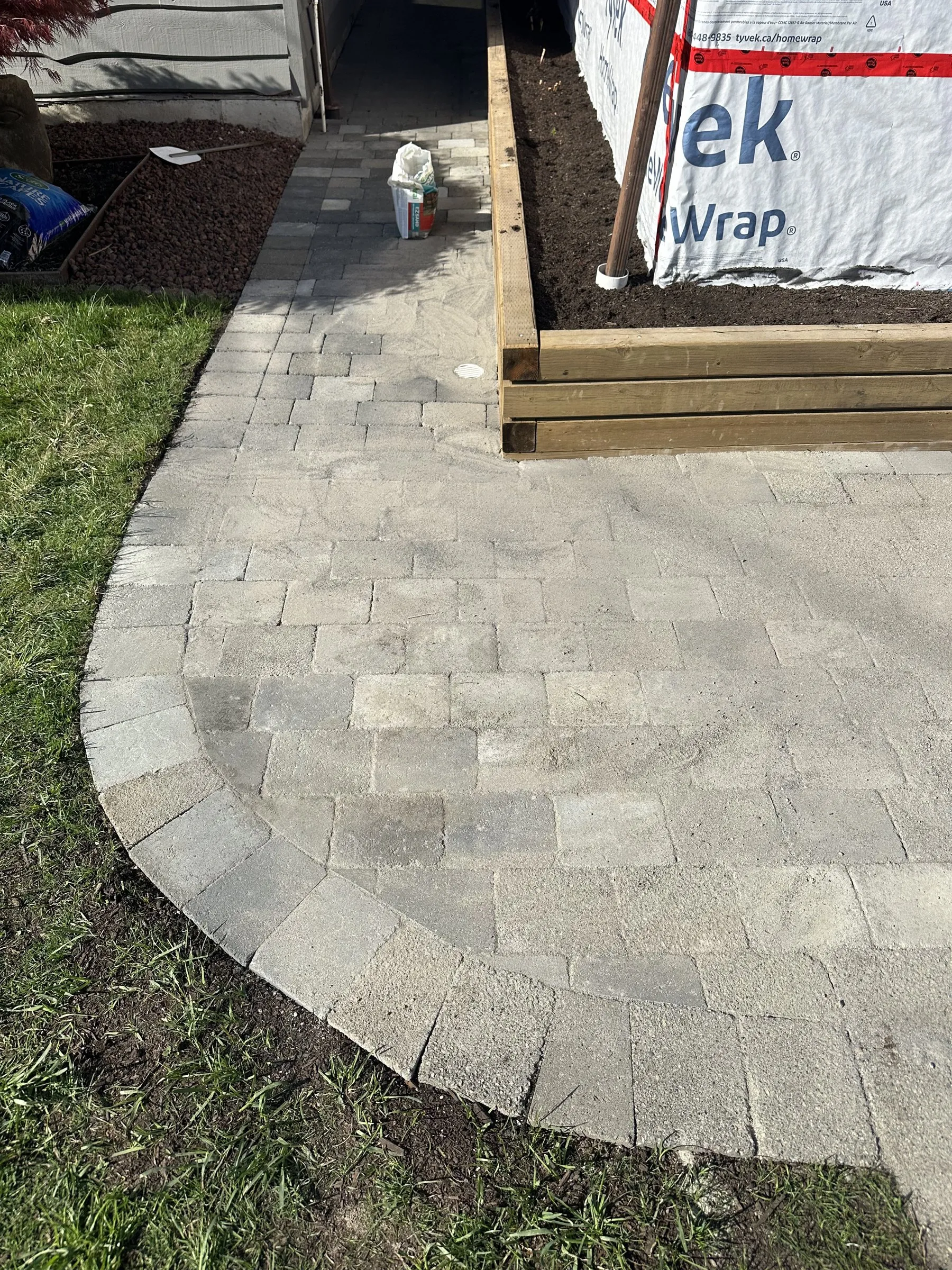 Curved stone paver walkway