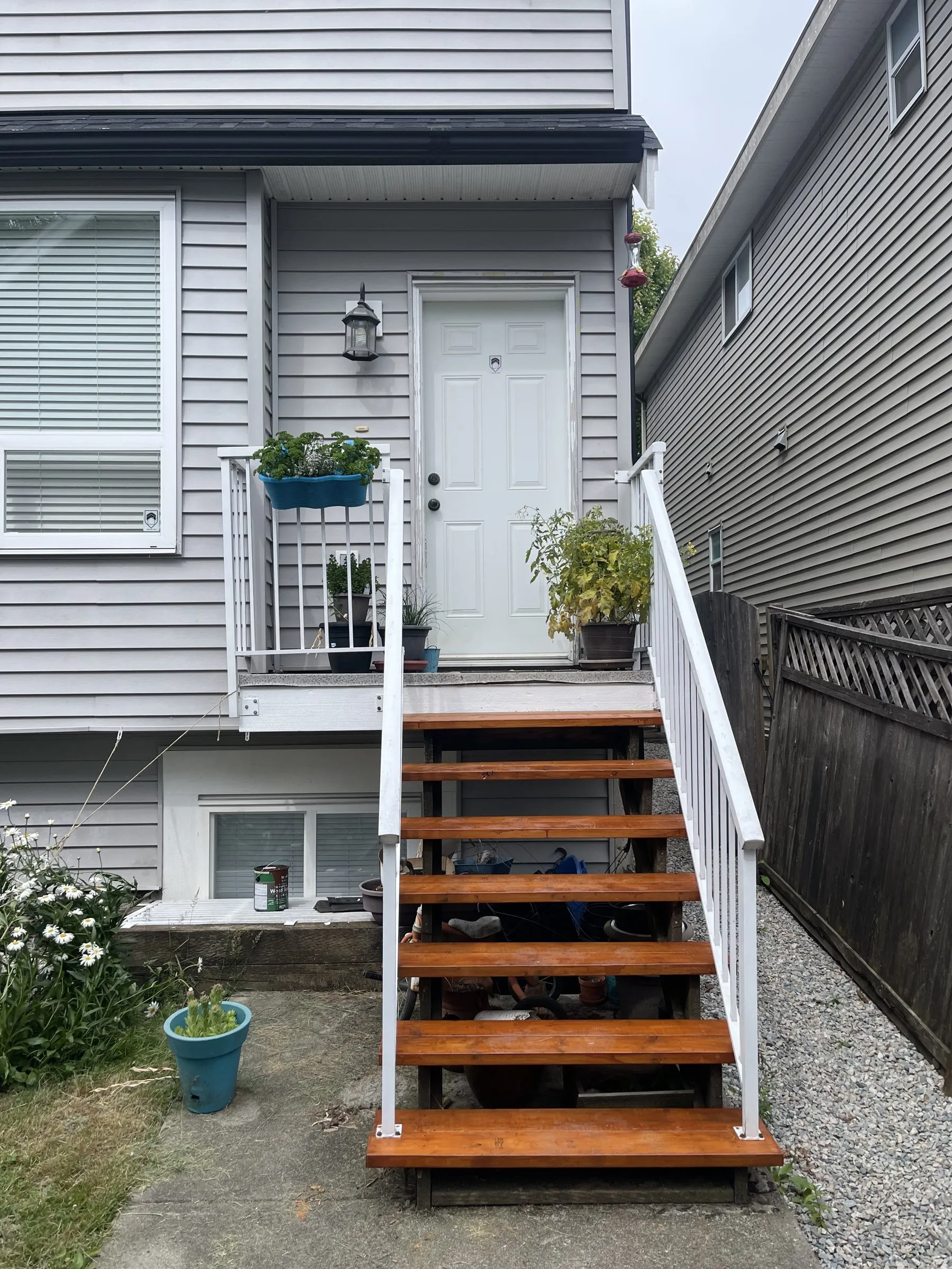 New wooden back stairs with white railings